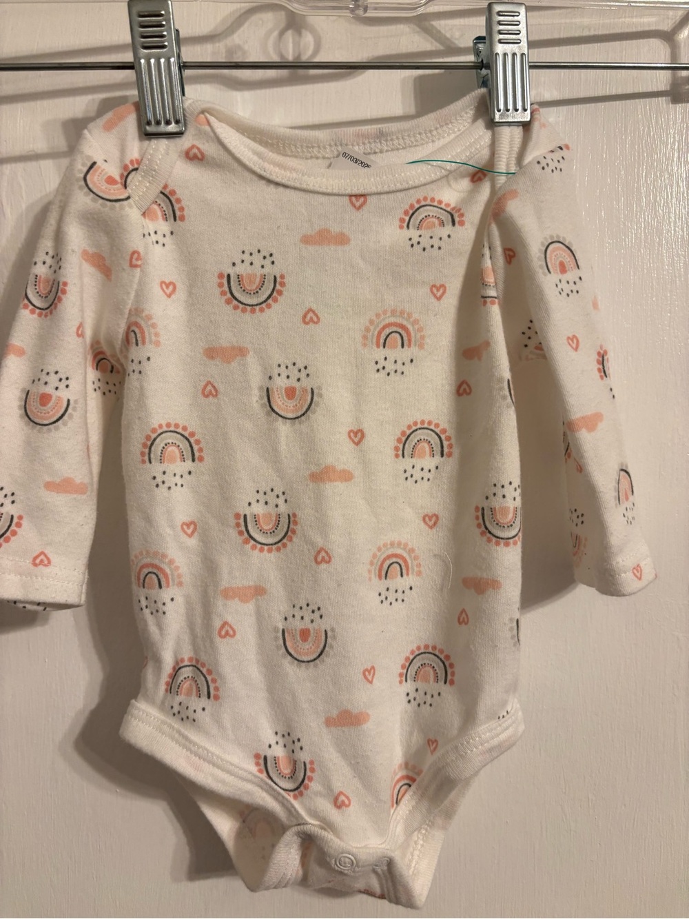 Long-Sleeve White Baby Bodysuit with Peach Rainbow Print